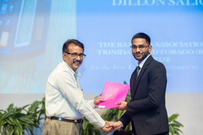 Dillon Salick receiving the Bankers Association of Trinidad and Tobago prize